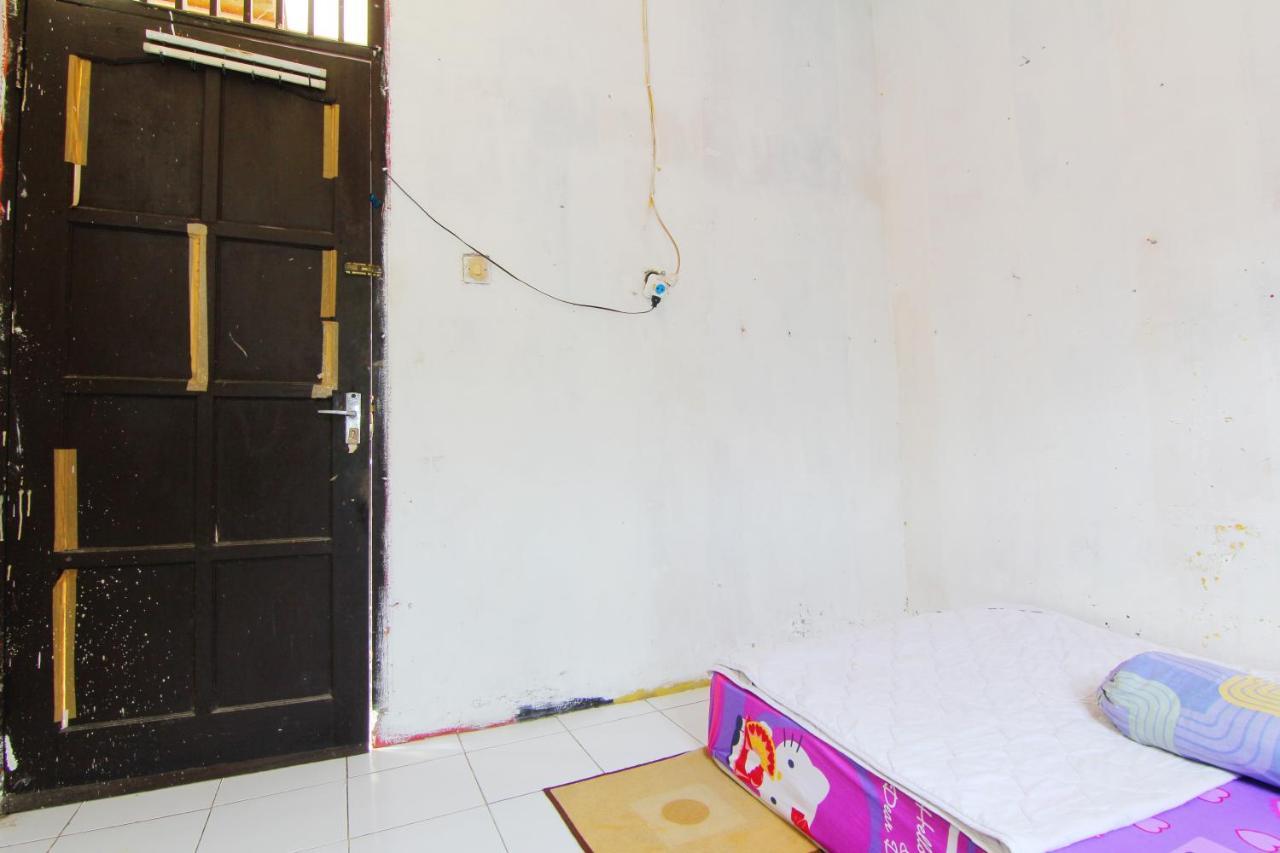D'Angkring Wisma Sarjana Maguwo Bagian luar foto